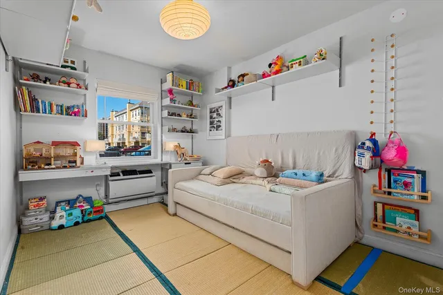 a bedroom with furniture and a bed