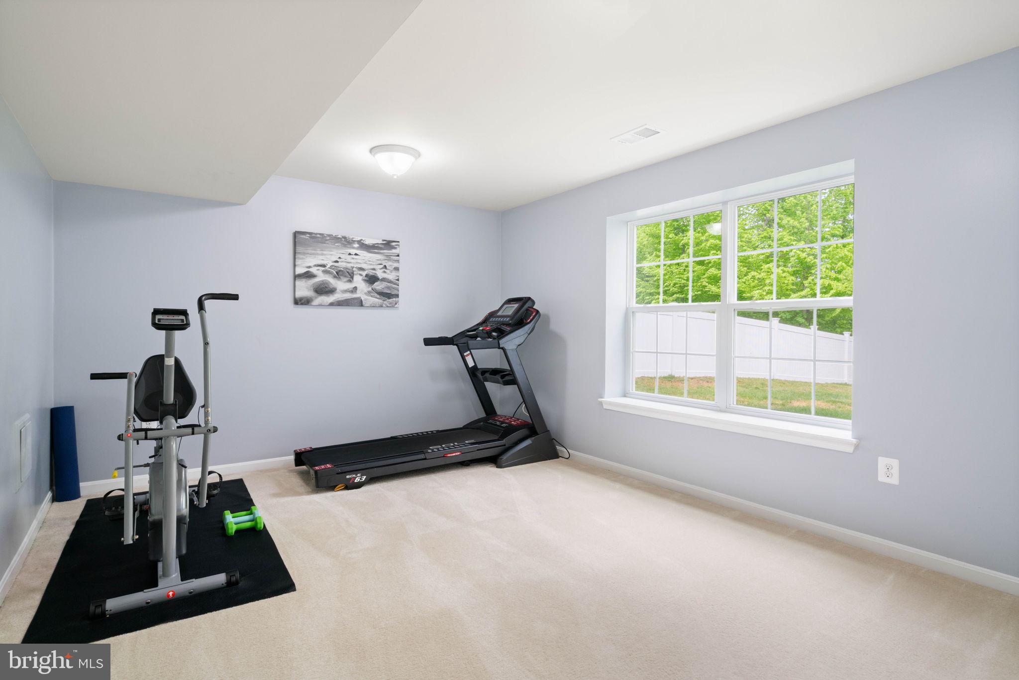 3486 Shandor Road Woodbridge, VA 22193 - Photo 36 of 40 5th Legal bedroom staged as fitness room