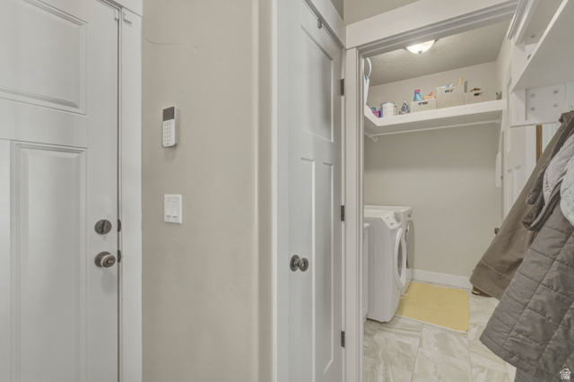 836 South 250 West Vernal, UT 84078 - Photo 30 of 56 Laundry area featuring washer and clothes dryer and baseboards