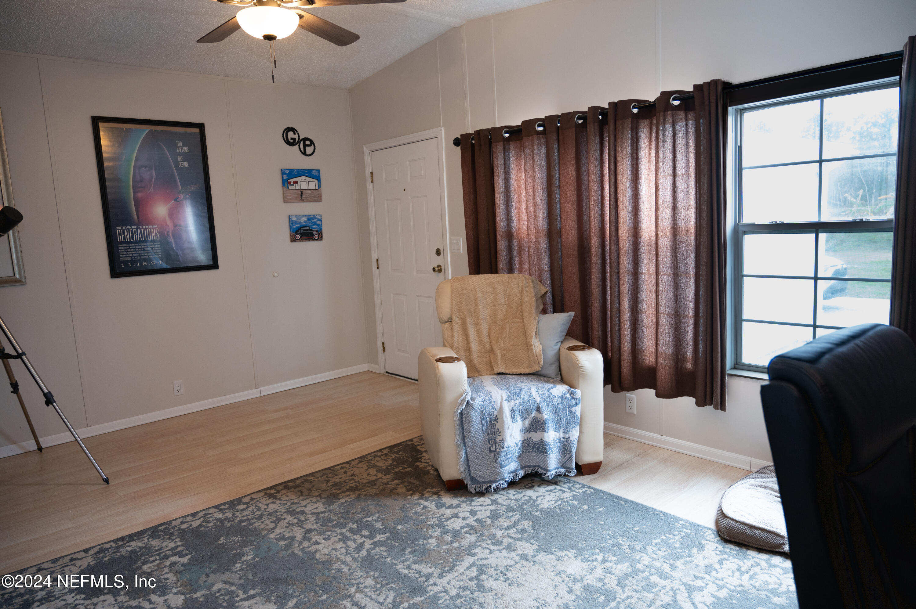 285 Dusty Road St. Augustine, FL 32095 - Photo 16 of 40 a living room with furniture and a window