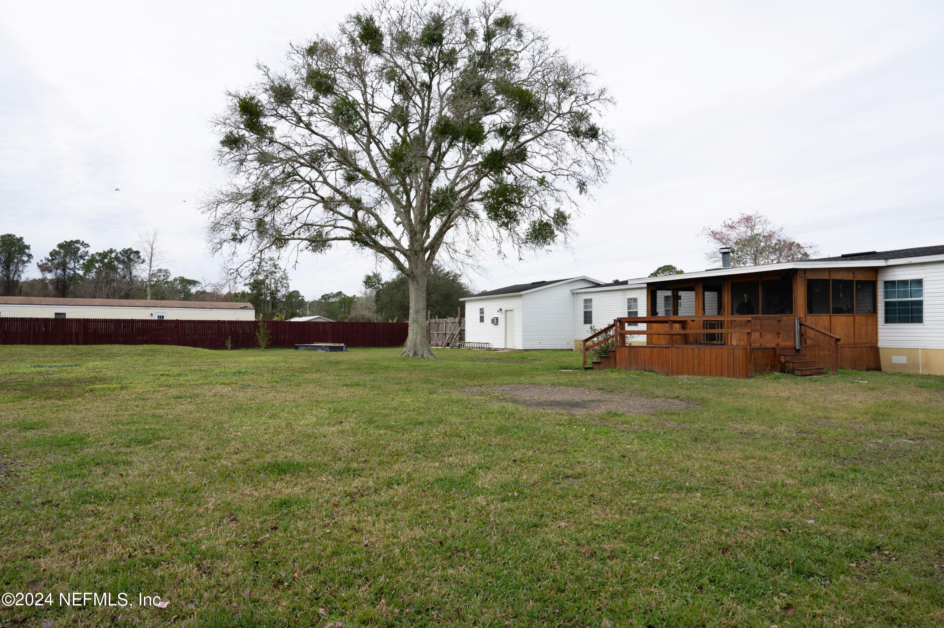 285 Dusty Road St. Augustine, FL 32095 - Photo 34 of 40 a front view of a house with garden