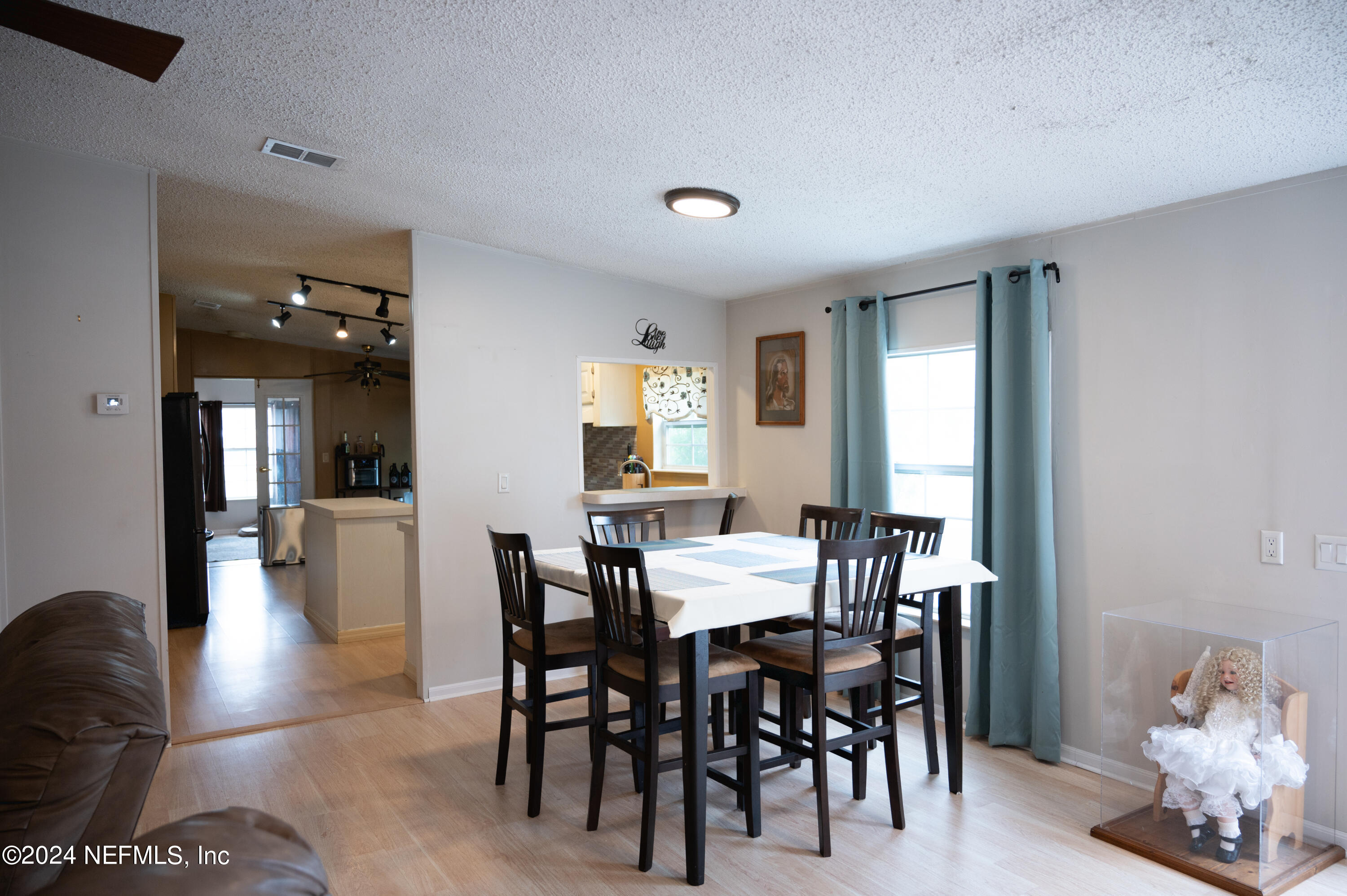 285 Dusty Road St. Augustine, FL 32095 - Photo 10 of 40 a view of a dining room with furniture