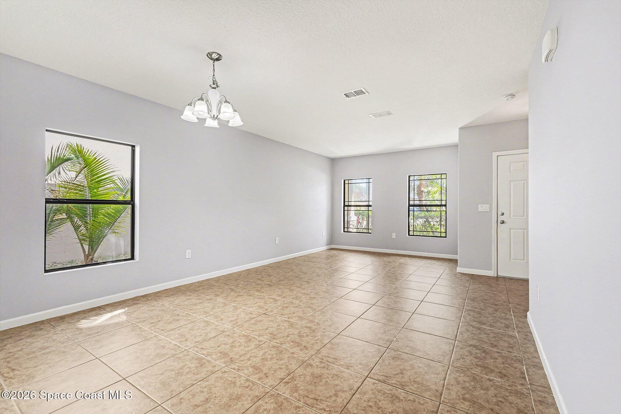 1363 Hailey Street Melbourne, FL 32904 - Photo 12 of 41 a view of livingroom with window