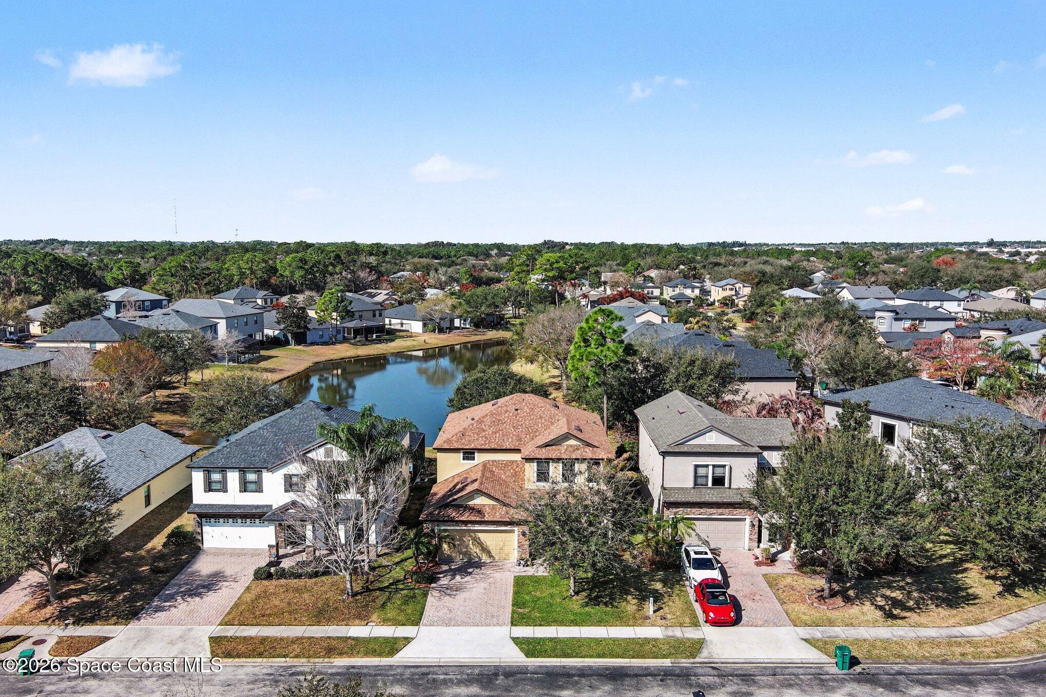 1363 Hailey Street Melbourne, FL 32904 - Photo 5 of 41 an aerial view of residential houses with outdoor space