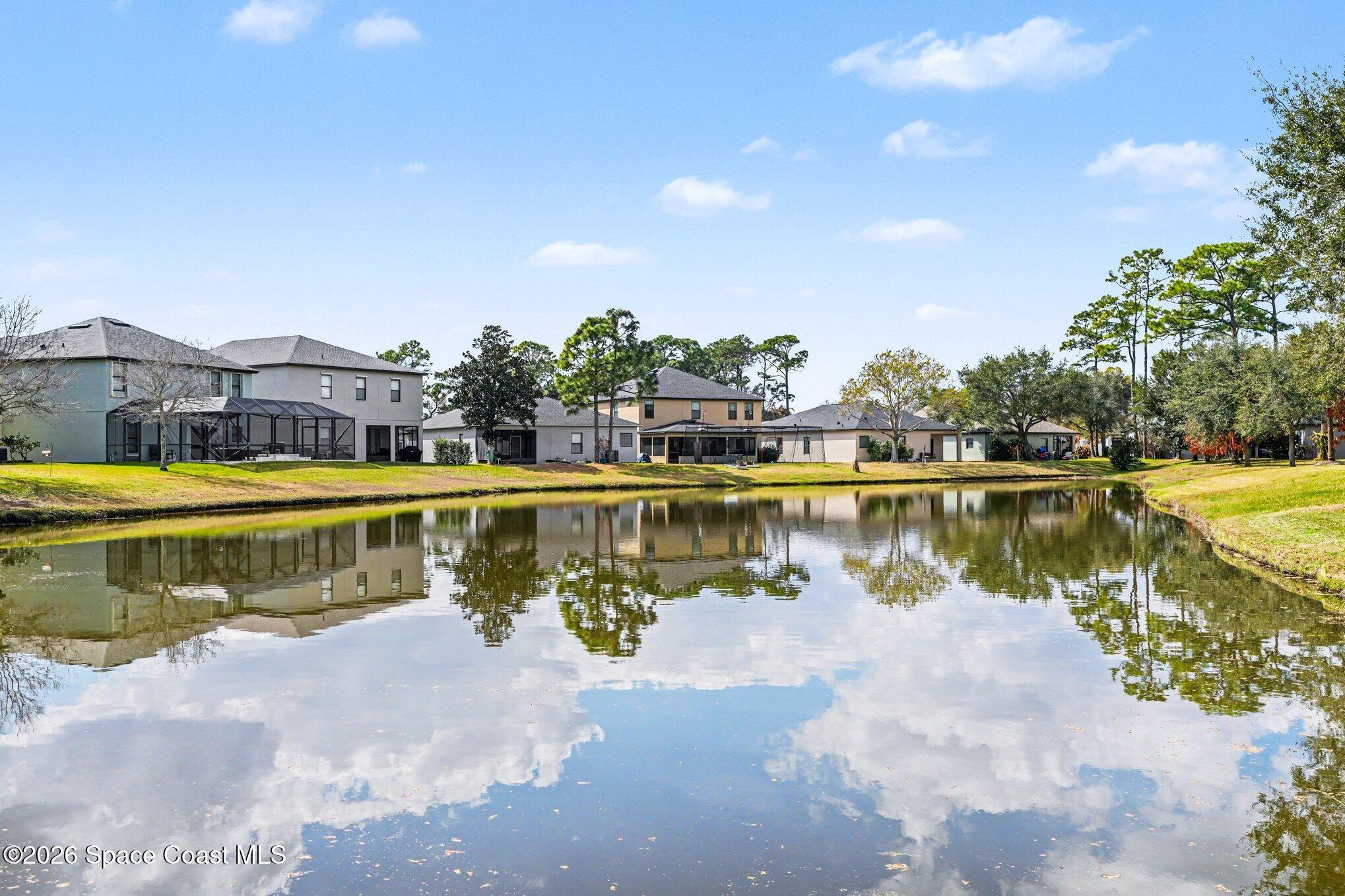 1363 Hailey Street Melbourne, FL 32904 - Photo 9 of 41 a view of a lake with a houses