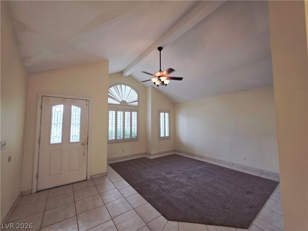 2920 Setting Sun Street Las Vegas, NV 89117 - Photo 12 of 43 This living space features vaulted ceilings, providing an airy and expansive atmosphere.