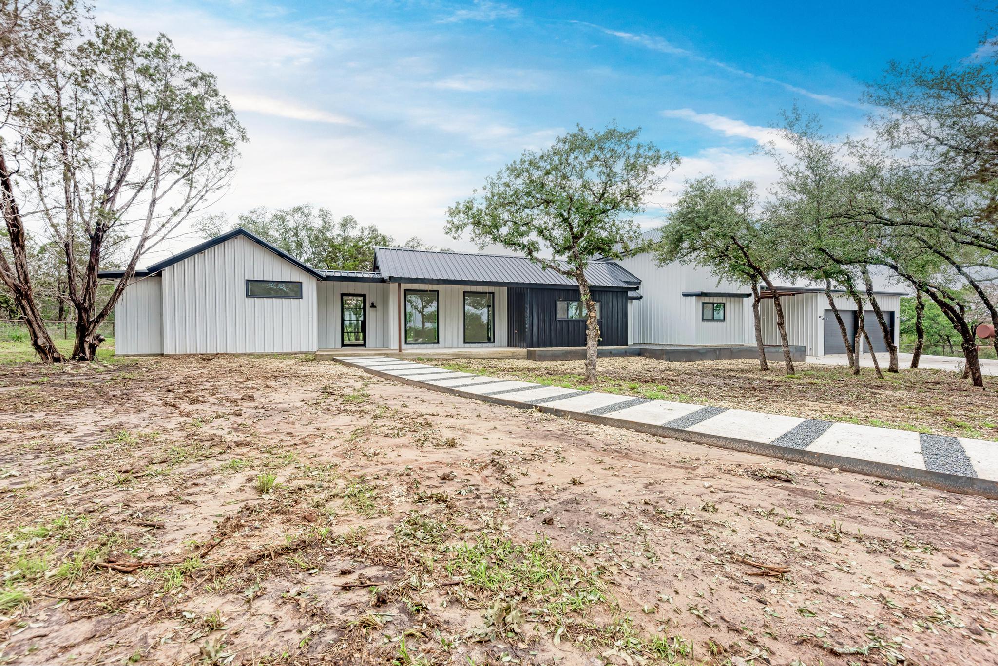 4190 West Fm 243 Bertram, TX 78605 - Photo 3 of 42 Modern farmhouse featuring a metal roof