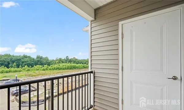 a view of a balcony with an outdoor space