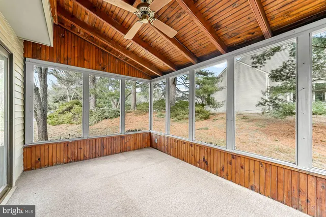 a view of porch with a garden