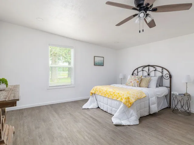 a kitchen with granite countertop cabinets stainless steel appliances a sink and a counter top space