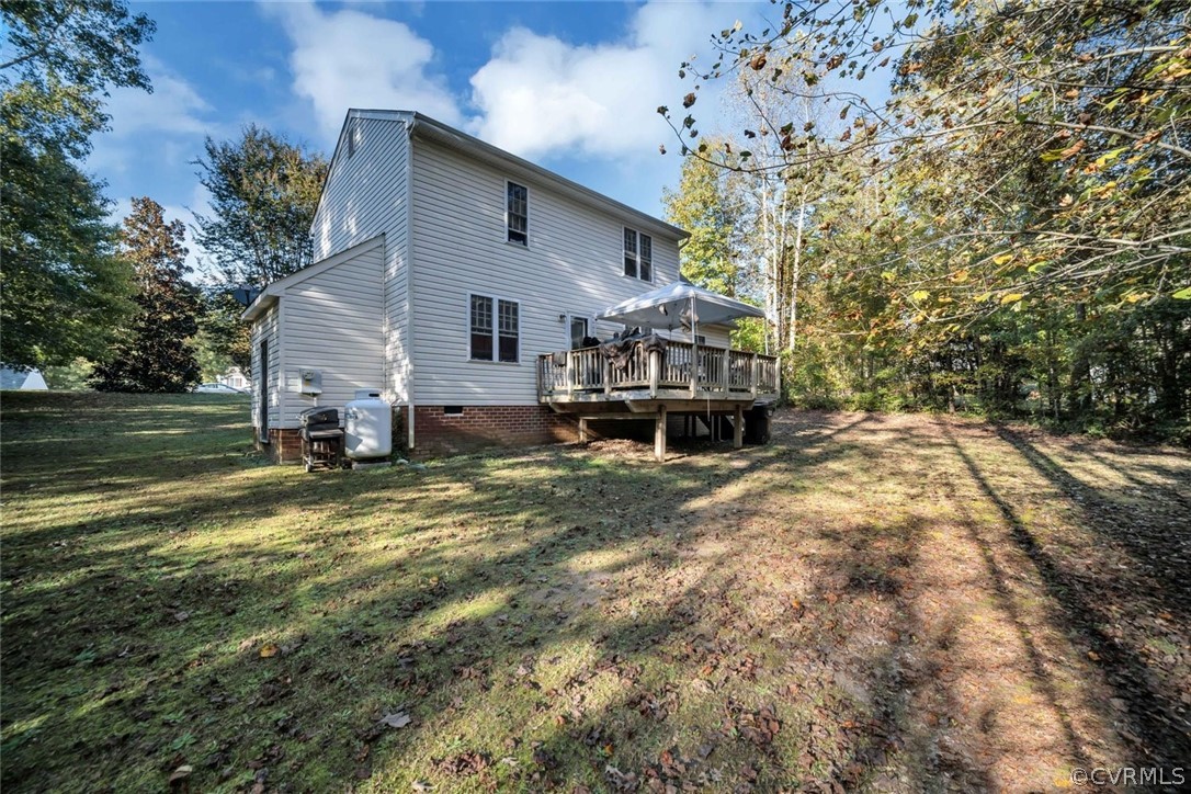 11619 Corte Castle Road Chesterfield, VA 23838 - Photo 17 of 18 a view of a house with a yard