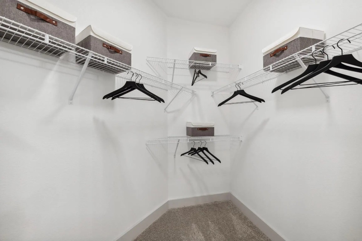 945 Blakey Lane, Unit 10304 Bastrop, TX 78602 - Photo 11 of 29 a view of walk in closet