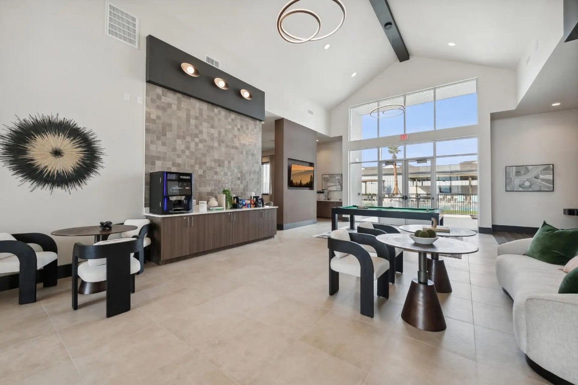 945 Blakey Lane, Unit 10304 Bastrop, TX 78602 - Photo 23 of 29 a living room with furniture and a fireplace