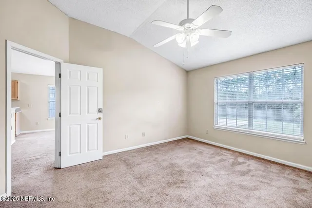 a bathroom with a bathtub shower and a sink