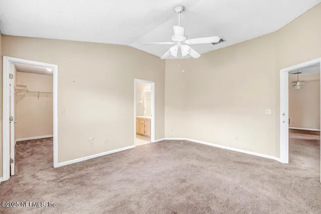 a bathroom with a bathtub shower sink double and mirror