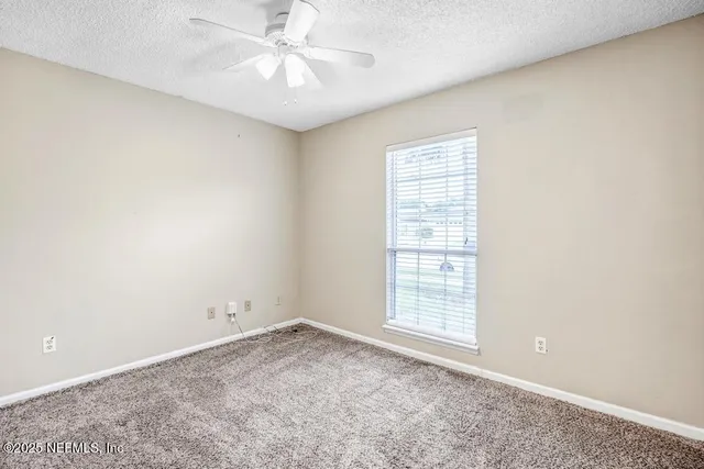 a view of a lake with a city