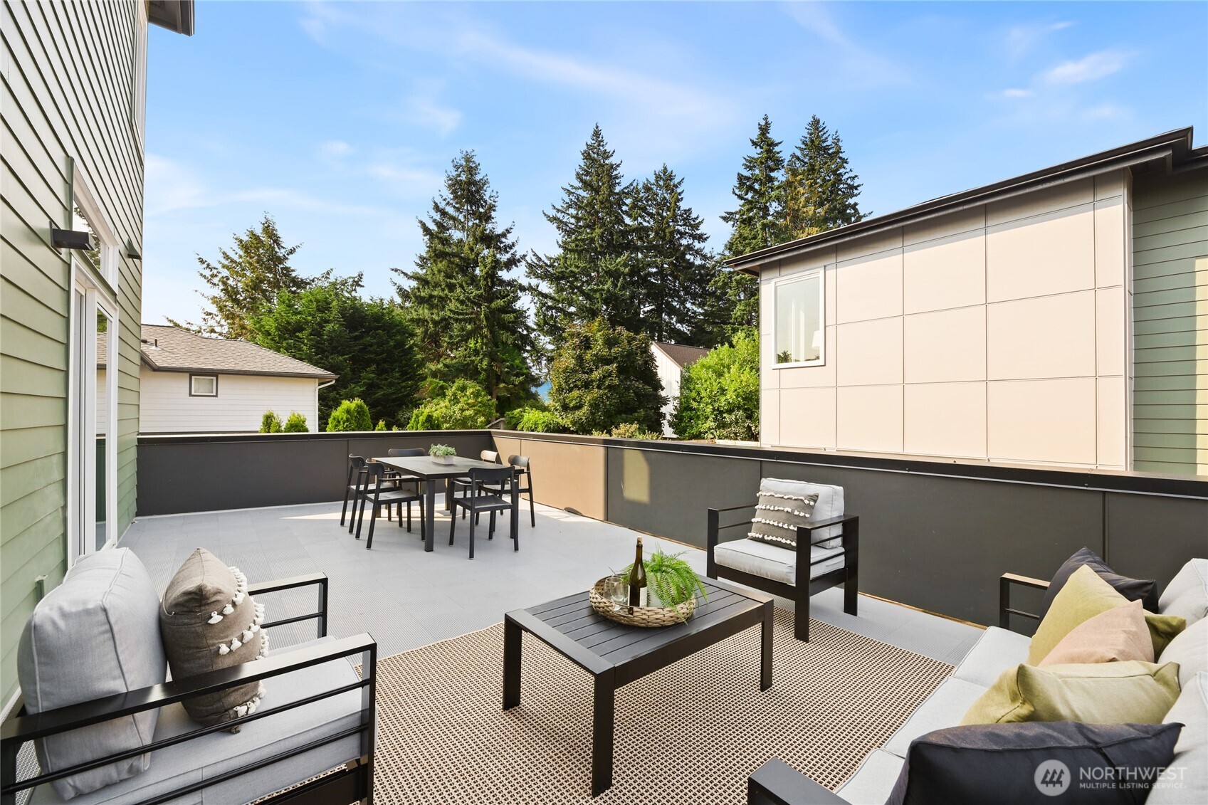12037 Fremont Avenue North, Unit 1 Seattle, WA 98133 - Photo 17 of 30 a outdoor living space with furniture