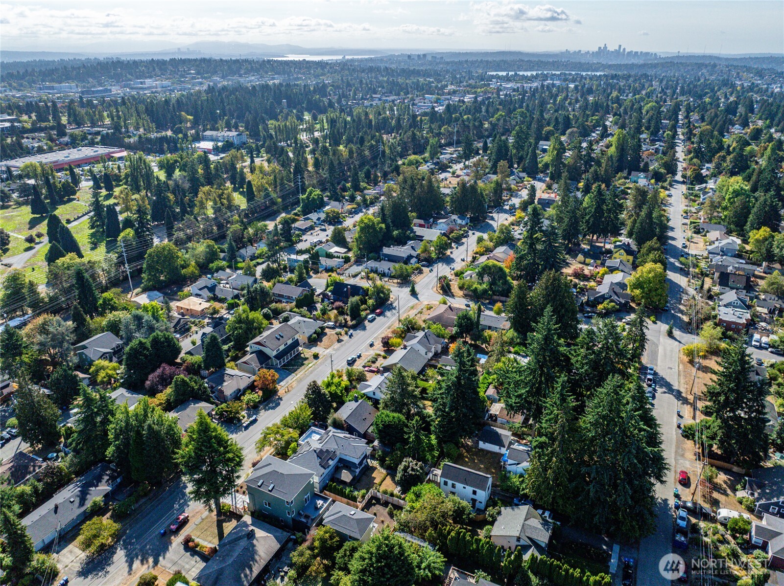 12037 Fremont Avenue North, Unit 1 Seattle, WA 98133 - Photo 29 of 30 an aerial view of a city with lots of residential buildings