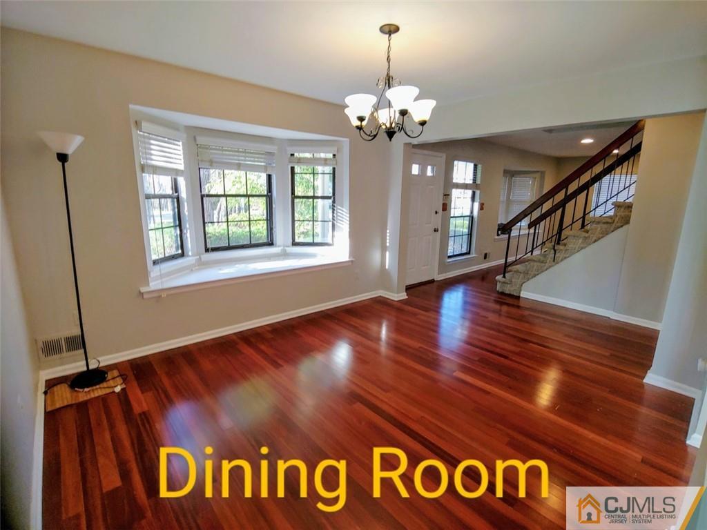 3305 Stonehedge Road Edison, NJ 08820 - Photo 5 of 14 a view of an entryway with wooden floor