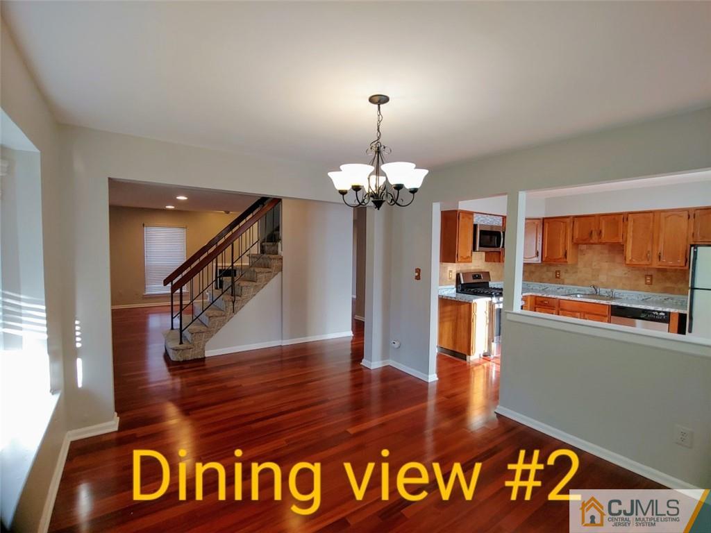 3305 Stonehedge Road Edison, NJ 08820 - Photo 6 of 14 a view of entryway and kitchen