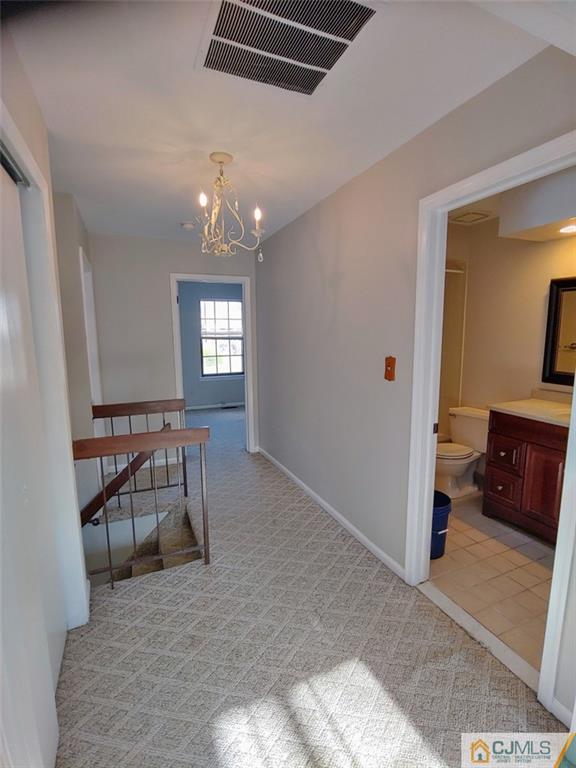 3305 Stonehedge Road Edison, NJ 08820 - Photo 8 of 14 a view of a livingroom with furniture and windows