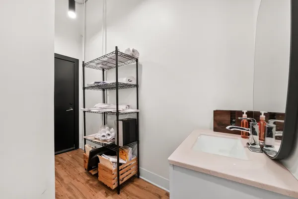 a view of a yard with plants and trees