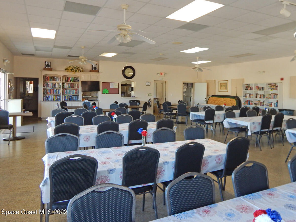 3112 Tangelo Drive Northeast Palm Bay, FL 32905 - Photo 29 of 42 a view of a dining room with furniture