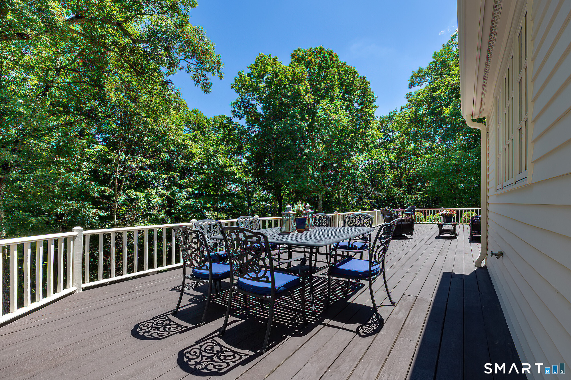62 Blacksmith Ridge Road Ridgefield, CT 06877 - Photo 34 of 40 View of the expansive deck off the back of the house where you can view the morning sunrise