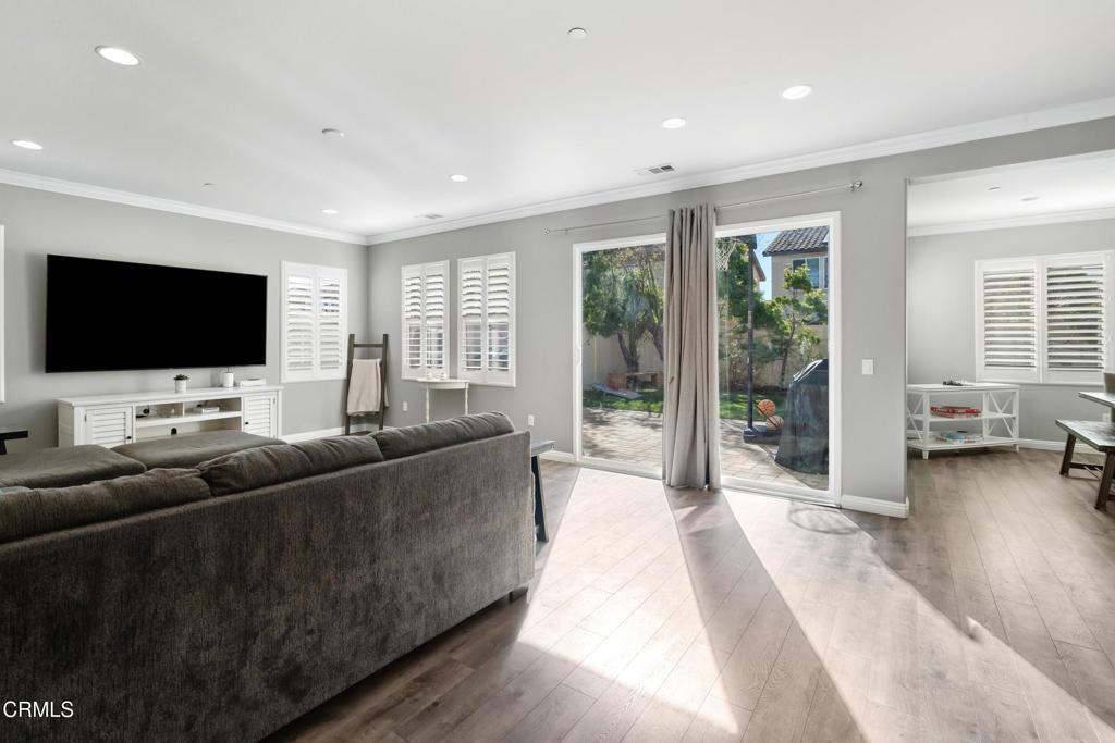 668 Whalen Way Oxnard, CA 93036 - Photo 15 of 57 a living room with furniture and a flat screen tv