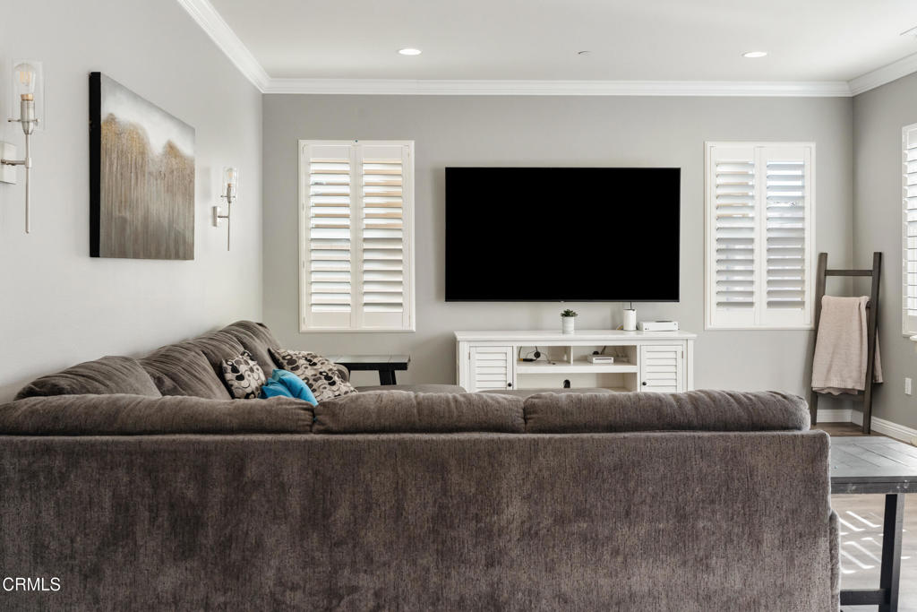668 Whalen Way Oxnard, CA 93036 - Photo 16 of 57 a living room with furniture and a flat screen tv