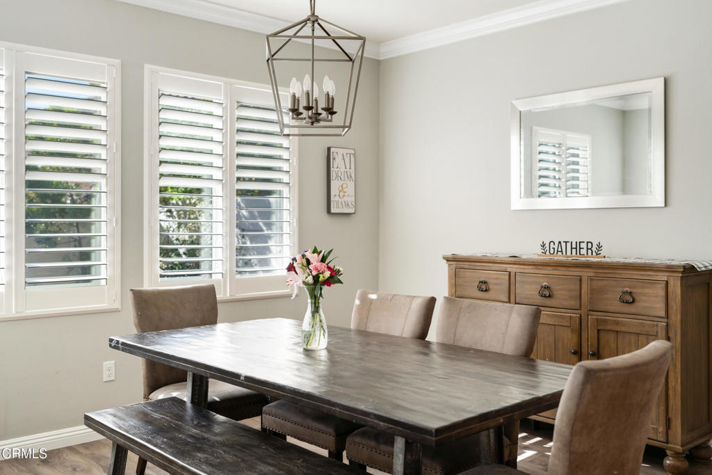 668 Whalen Way Oxnard, CA 93036 - Photo 18 of 57 a view of a dining room with furniture window and wooden floor