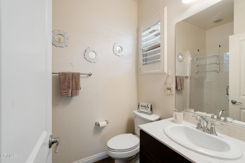 668 Whalen Way Oxnard, CA 93036 - Photo 20 of 57 a bathroom with a sink toilet and shower