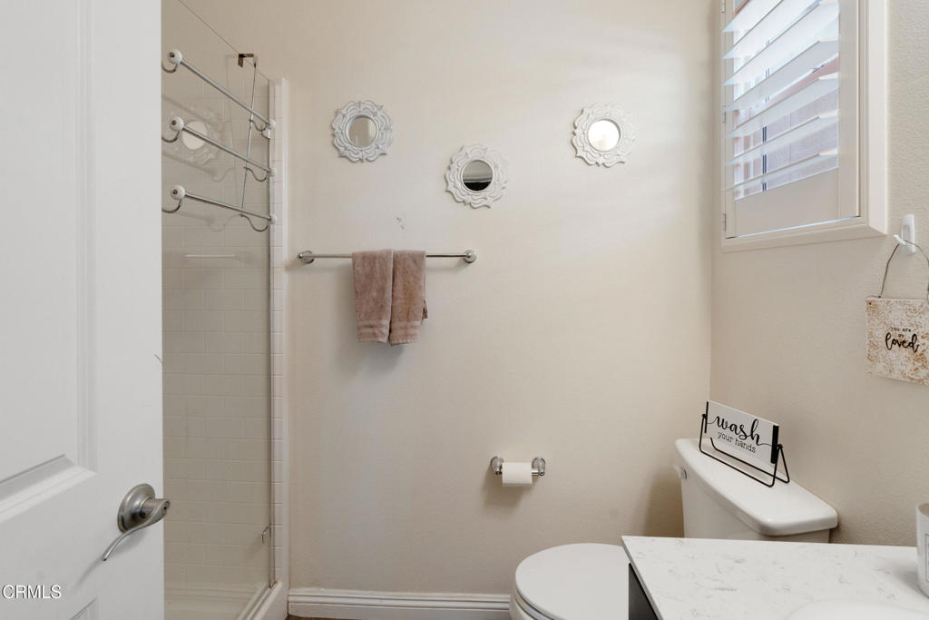 668 Whalen Way Oxnard, CA 93036 - Photo 21 of 57 a white toilet sitting next to a bathroom sink