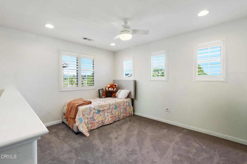 668 Whalen Way Oxnard, CA 93036 - Photo 22 of 57 a bed room with bed and a window