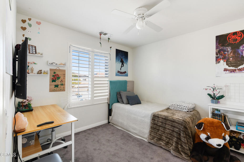668 Whalen Way Oxnard, CA 93036 - Photo 23 of 57 a bedroom with a bed and a window