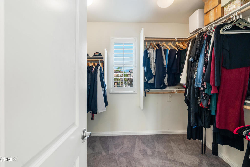 668 Whalen Way Oxnard, CA 93036 - Photo 30 of 57 a view of walk in closet with clothes and shoes