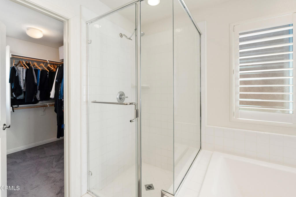 668 Whalen Way Oxnard, CA 93036 - Photo 31 of 57 a bathroom with a shower and a tub