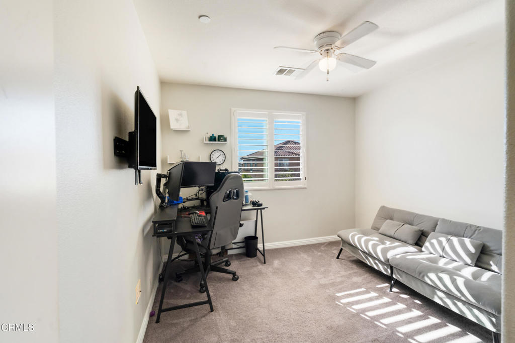 668 Whalen Way Oxnard, CA 93036 - Photo 33 of 57 a view of a livingroom with workspace and a couch