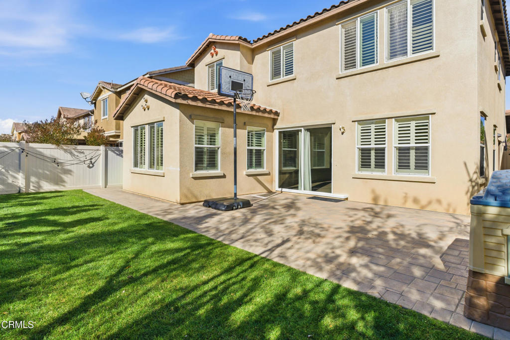 668 Whalen Way Oxnard, CA 93036 - Photo 36 of 57 a front view of a house with a garden