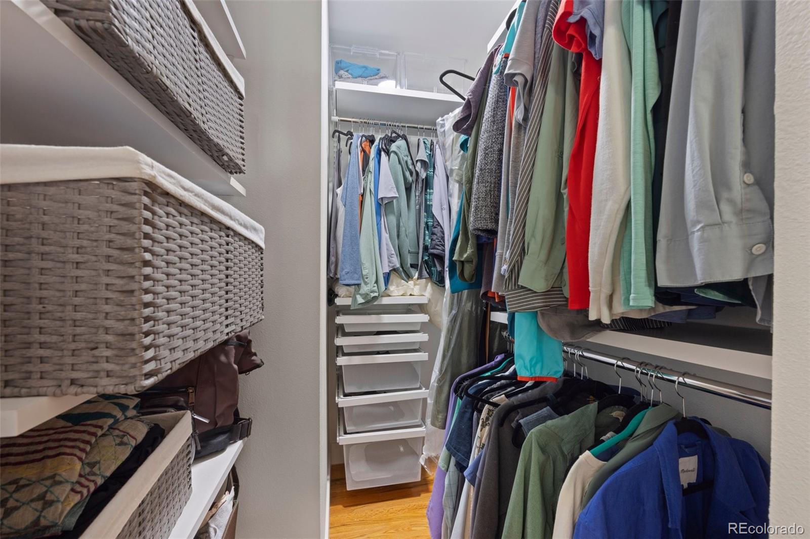 703 South Oneida Way Denver, CO 80224 - Photo 15 of 24 a view of a walk in closet