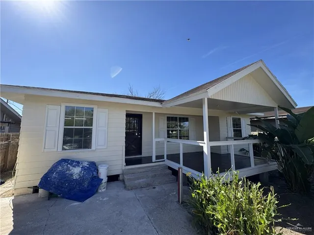 a house view with a garden space