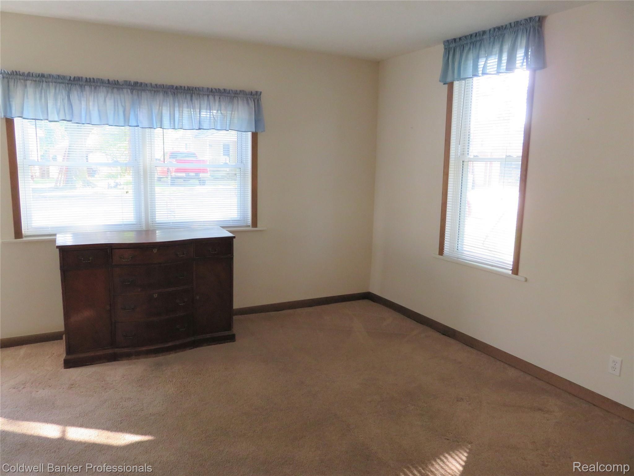 119 East 3rd Street Perry, MI 48872 - Photo 8 of 16 10 119 living room.JPG