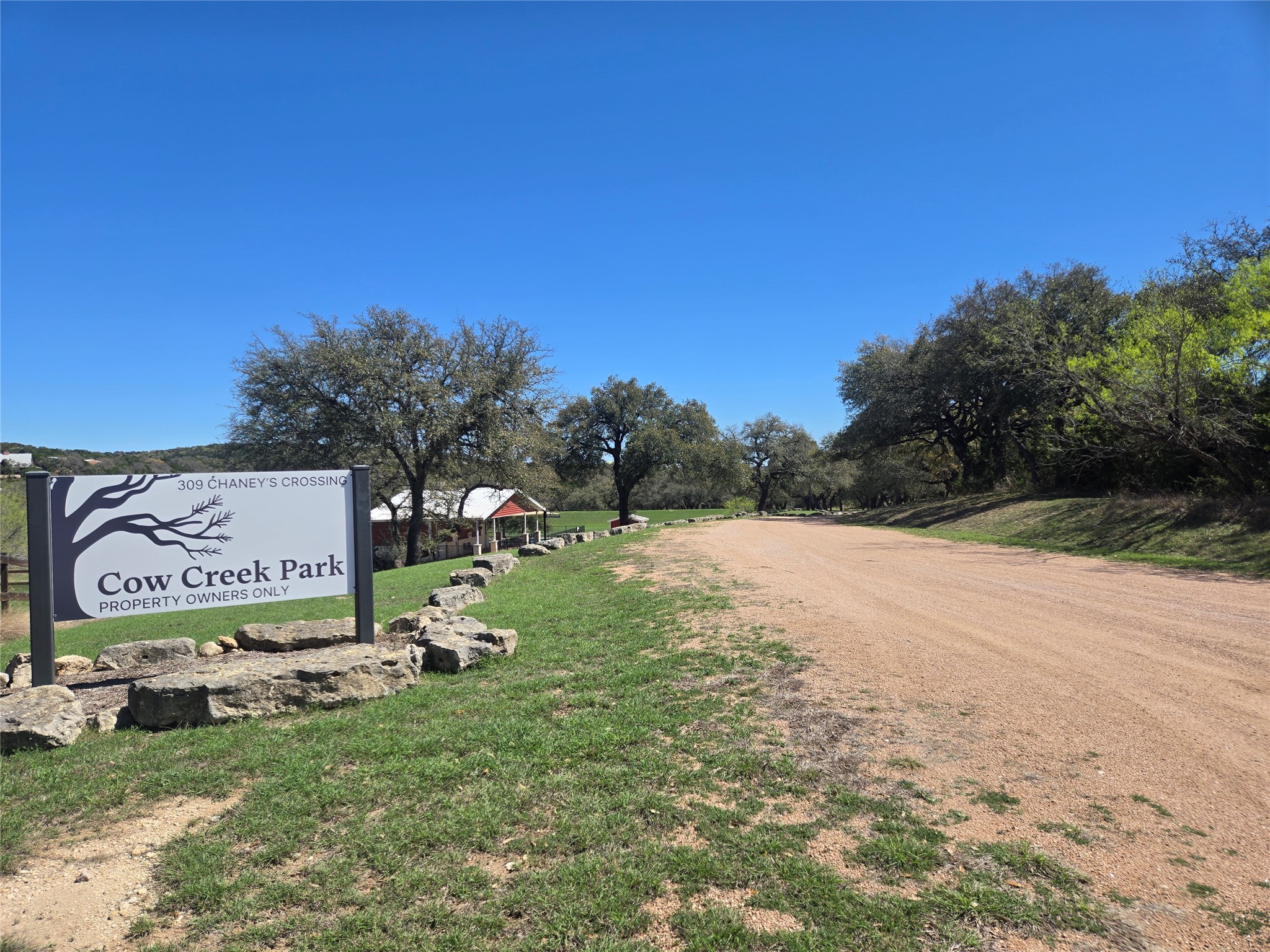 358 Balcones Ridgeway Way Bertram, TX 78605 - Photo 16 of 24 a view of a park with welcome board