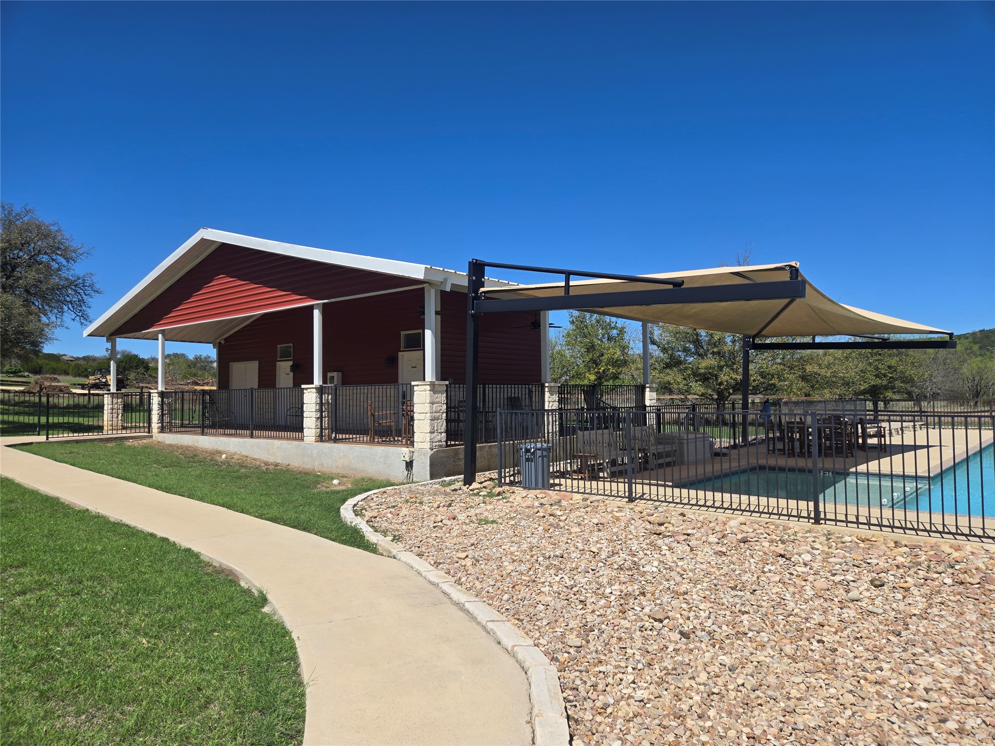 358 Balcones Ridgeway Way Bertram, TX 78605 - Photo 19 of 24 a patio with table and chairs