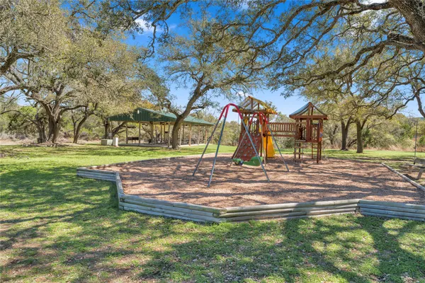 a view of a yard with an outdoor space