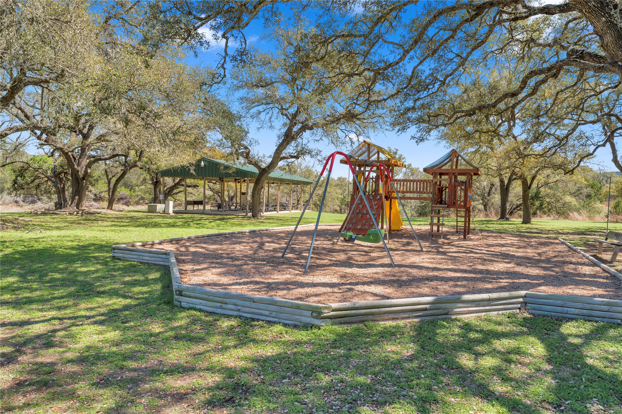 358 Balcones Ridgeway Way Bertram, TX 78605 - Photo 20 of 24 a view of park with large trees