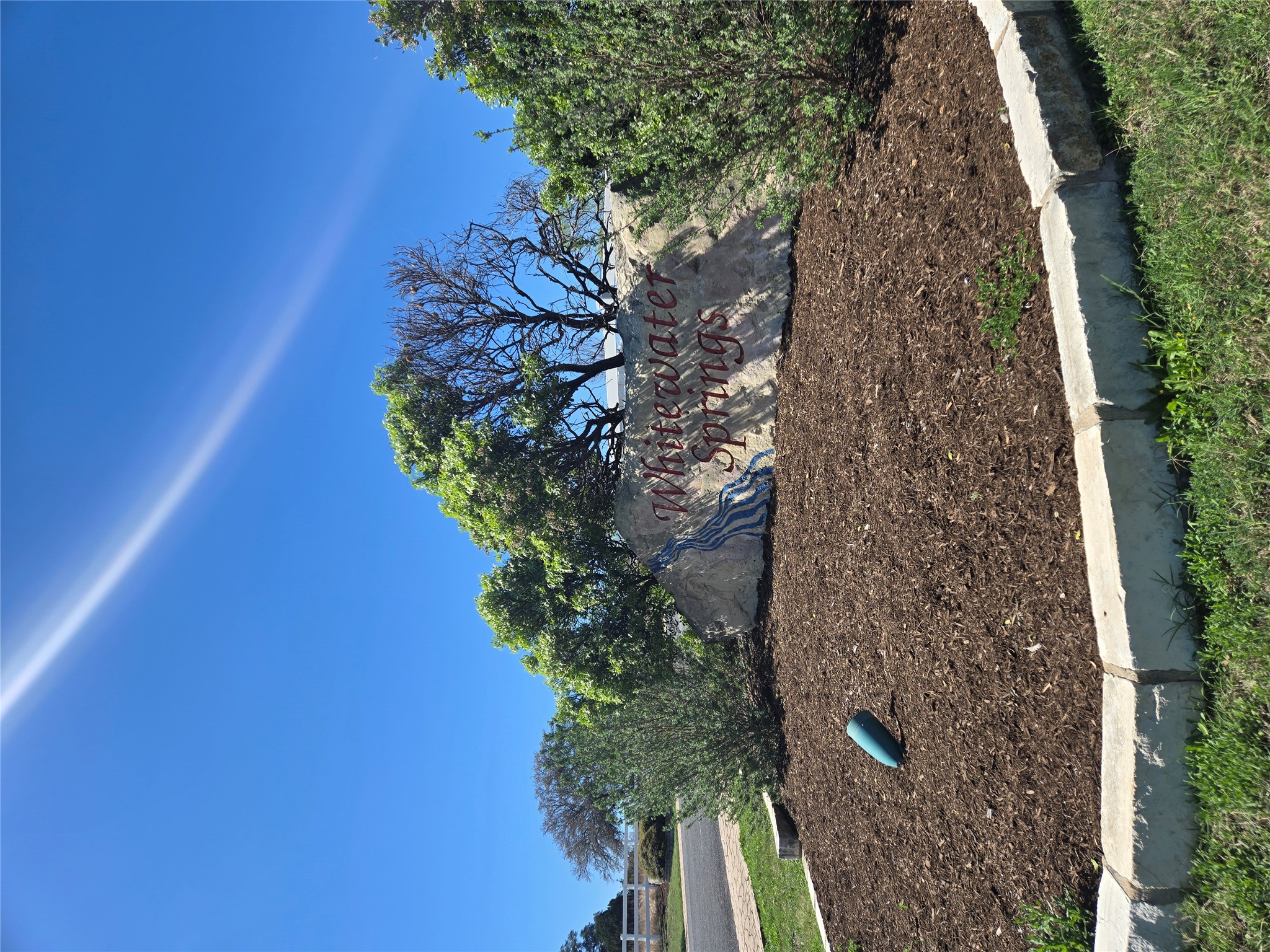 358 Balcones Ridgeway Way Bertram, TX 78605 - Photo 22 of 24 a view of a yard with an outdoor space