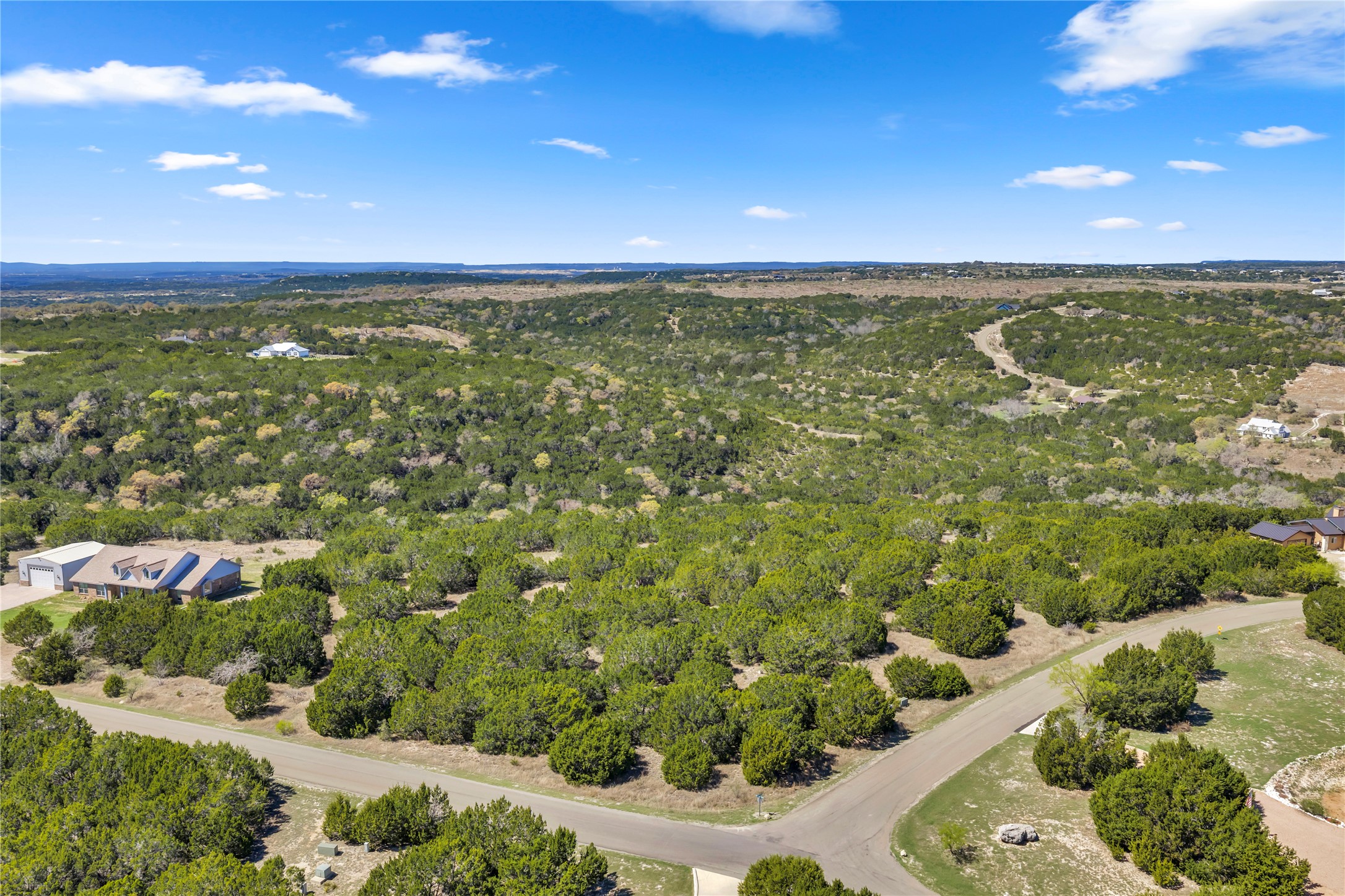 358 Balcones Ridgeway Way Bertram, TX 78605 - Photo 4 of 24 a view of an ocean and beach