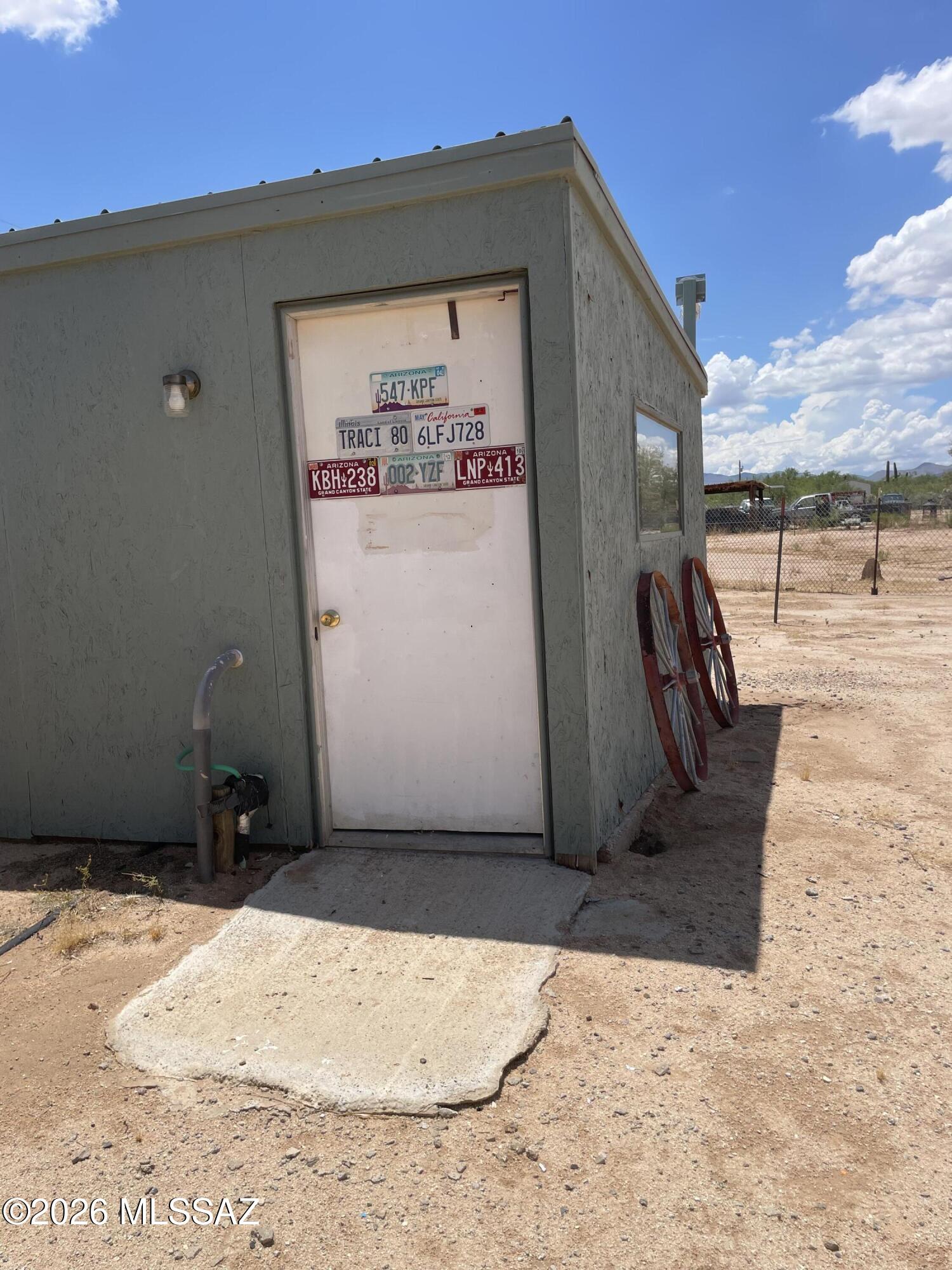 8535 South Marstellar Road Tucson, AZ 85736 - Photo 14 of 30 Stucco Building with door