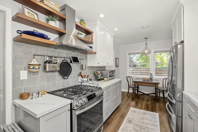 a view of a dining room with furniture window and outside view